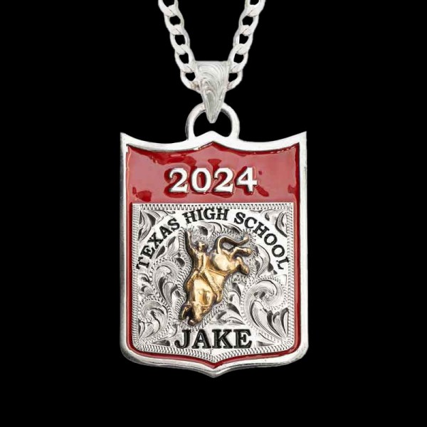 " Rodeo mamas, get this necklace for your rodeo kid and they'll never take it off. Crafted on a German Silver base with hand-engraved scrollwork. Detailed with our signature red enamel and a rodeo figure of your choice. Scroll down to customize your 
